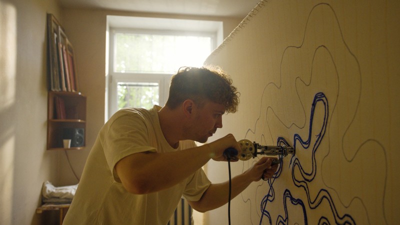 Man working on whiteboard